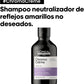 L'Oreal Chroma Creme shampoo bottle with text on a white background